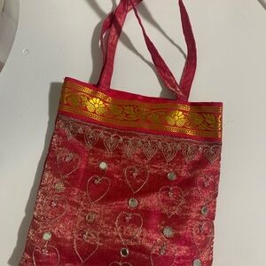 Elegant Red Tote Bag with Gold Accents